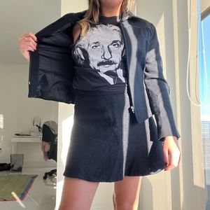 Black textured jacket with leather like detail made in Peru dry clean only